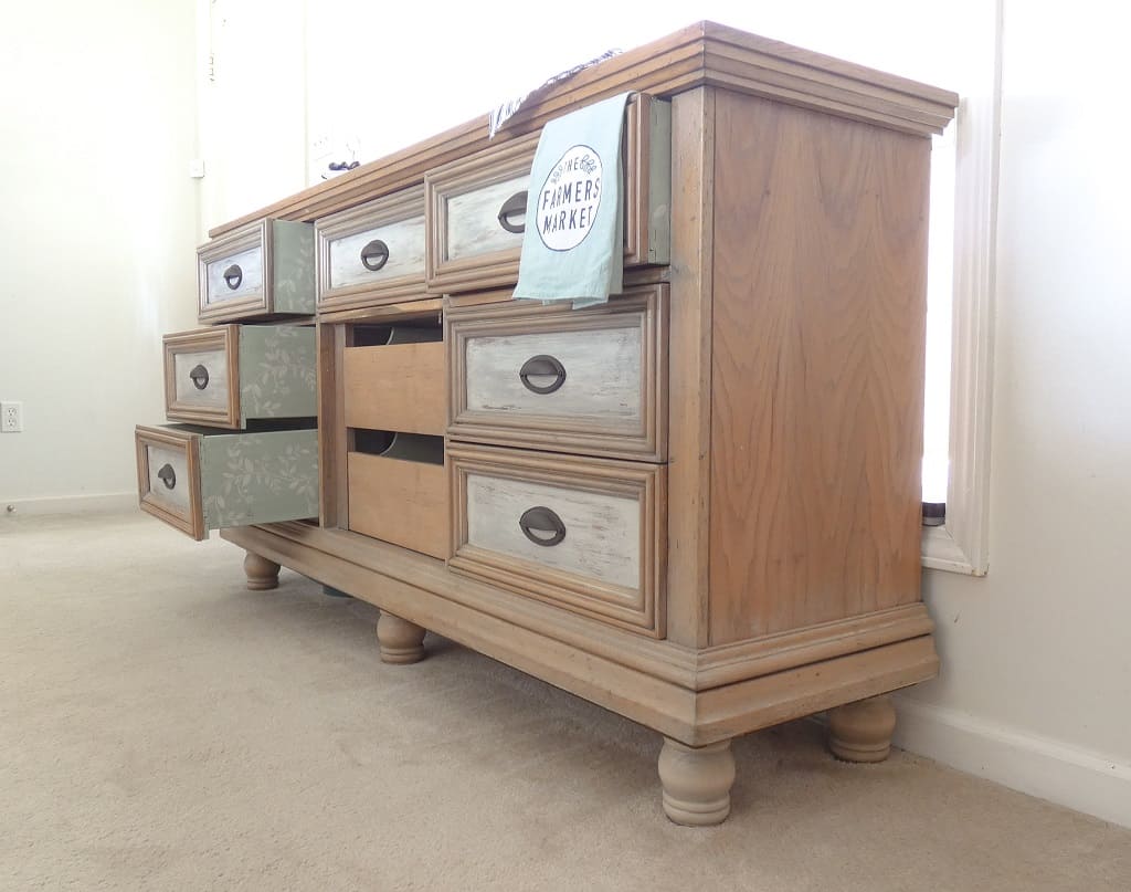 raw wood finish dresser with stained drawer fronts and painted and stenciled drawers