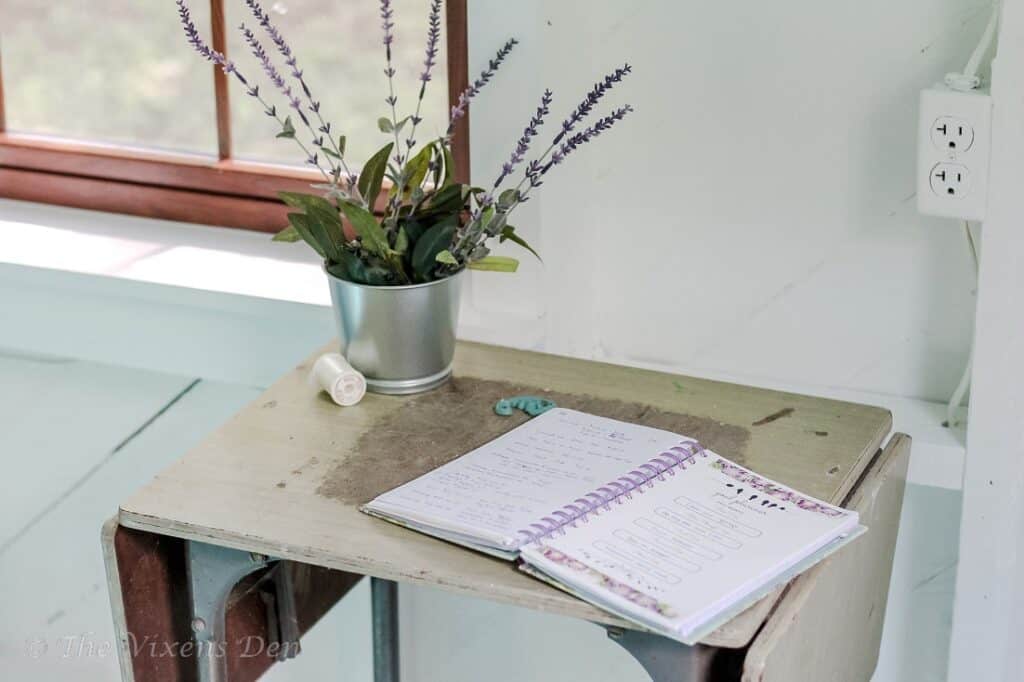 folding table with lavender shoots and planner