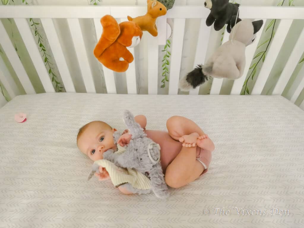 baby laying in crib