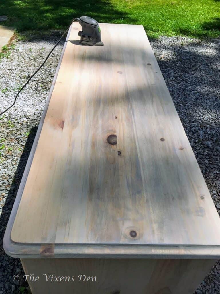 dresser top with blotchy stain