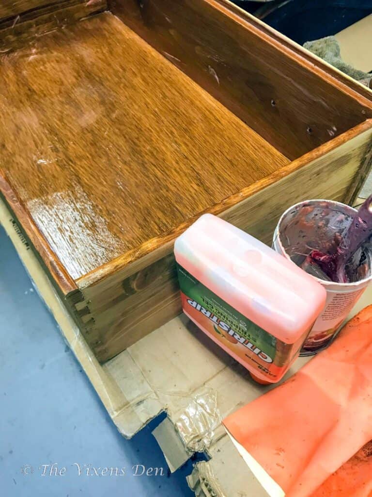 dresser drawer with citristrip finish remover applied