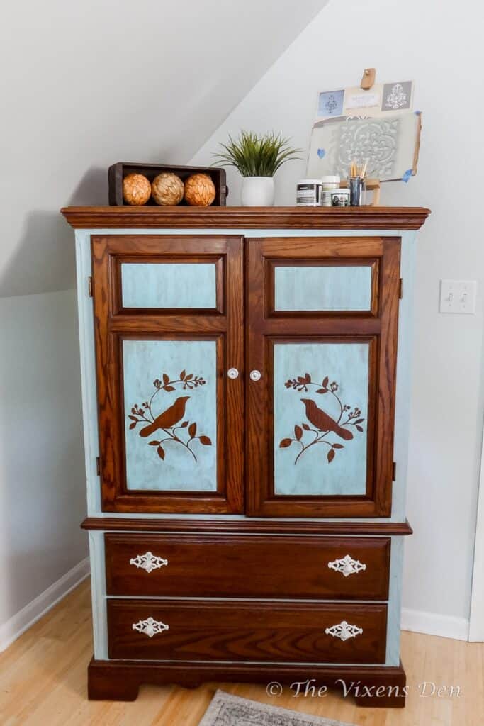 paint washed and stained armoire/craft cabinet with white hardware