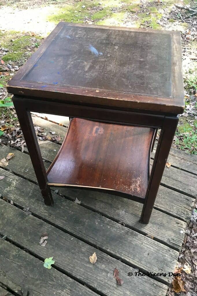 scratched and damaged square side table with dark cherry finish