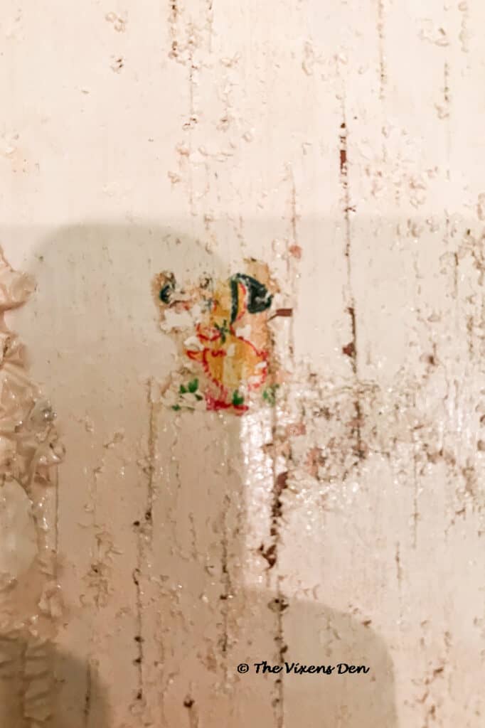 original paint design remnants from an old Sellers cabinet door
