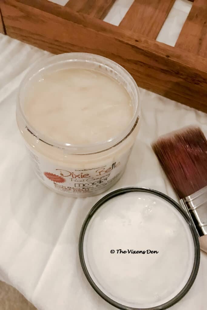 an open container of Dixie Belle BOSS and a mini angle brush