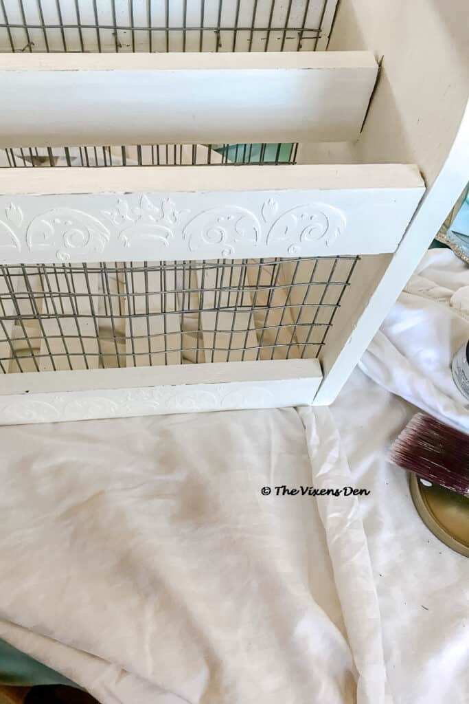 repurposed magazine rack with Dixie Mud raised stencil