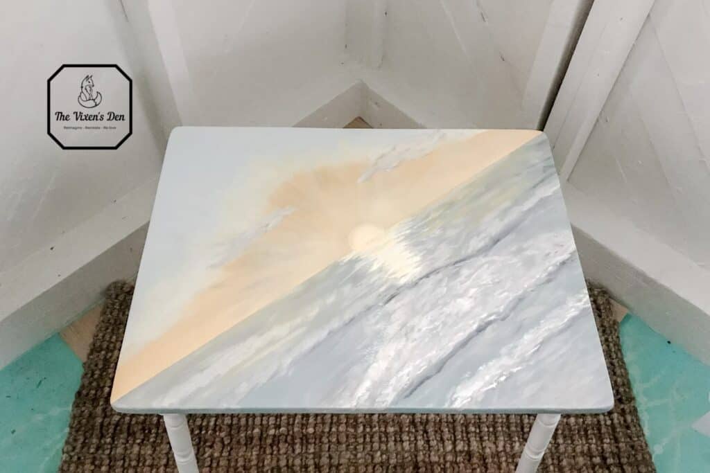 overview of the sunrise and ocean painted on the children's table