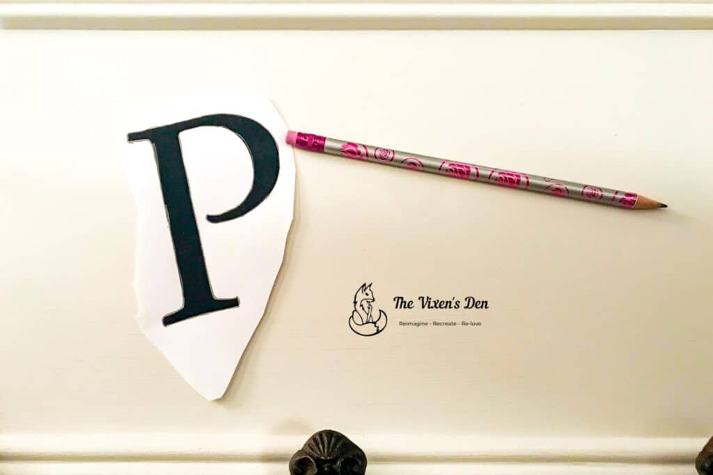 printed monogram P with pencil