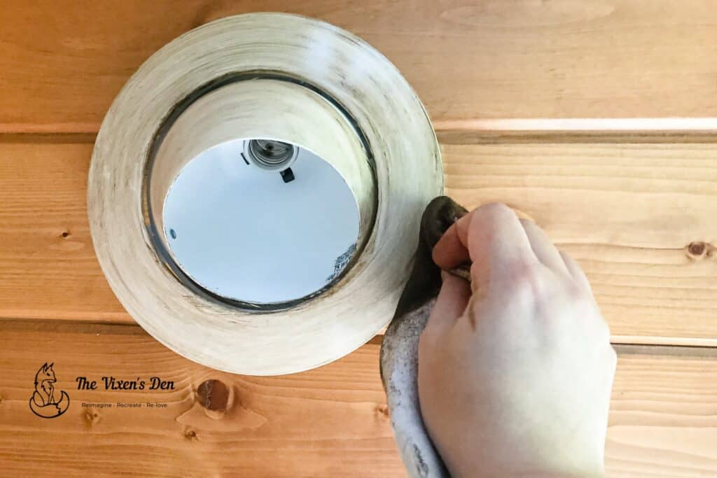 adding the top stain coat to the recessed metal can light