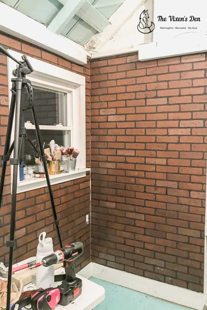 she shed faux brick wall paneling-min