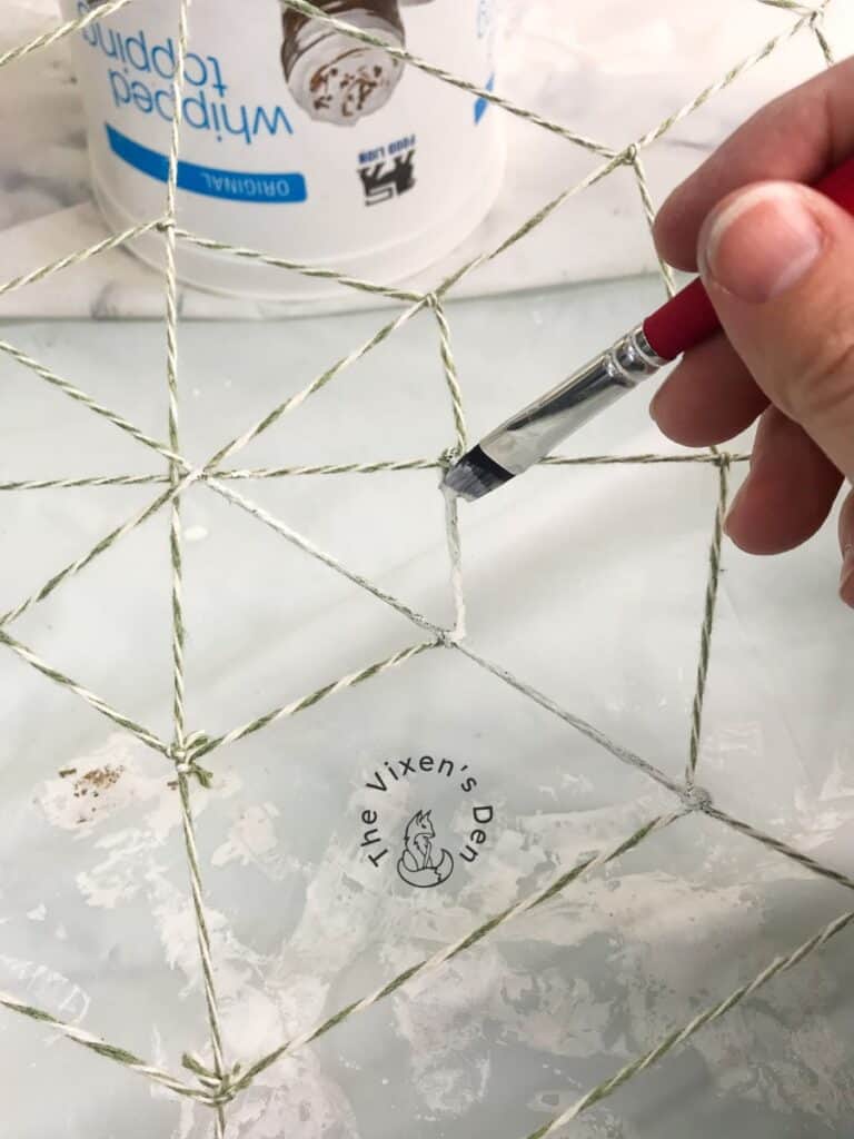 process - painting spider web