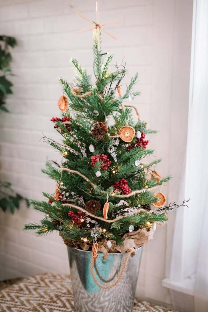 tabletop Christmas tree with DIY rustic ornaments and dried clementine orange slice ornaments