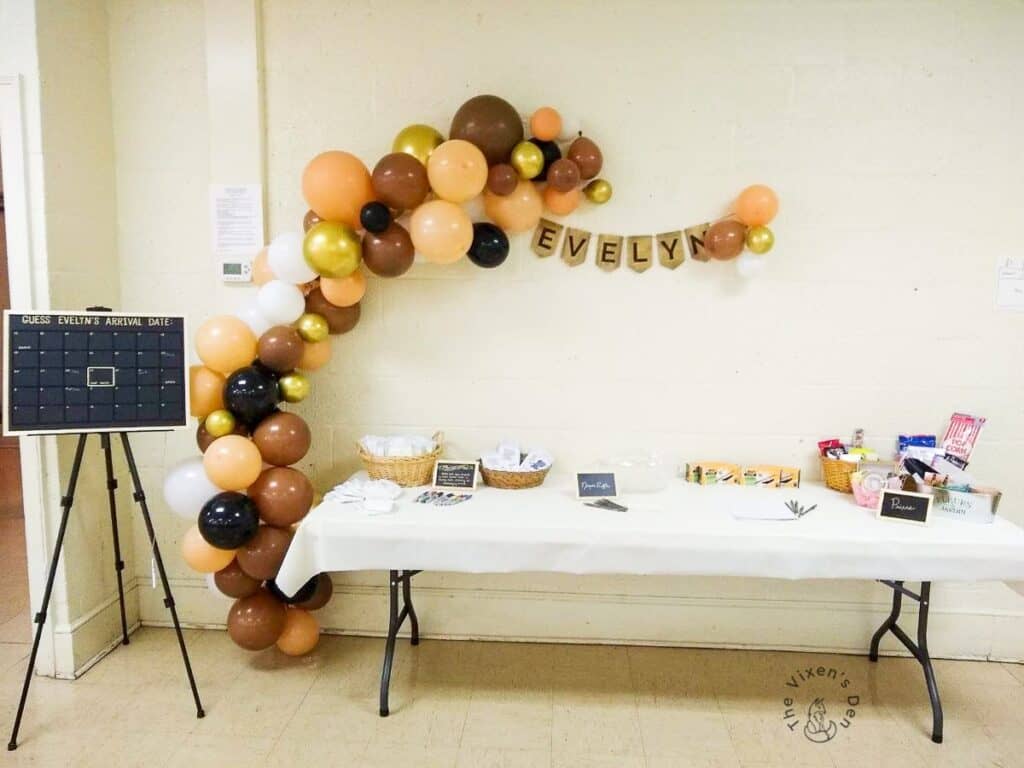 Final Evelyn Woodburned Name Banner with baby shower setup