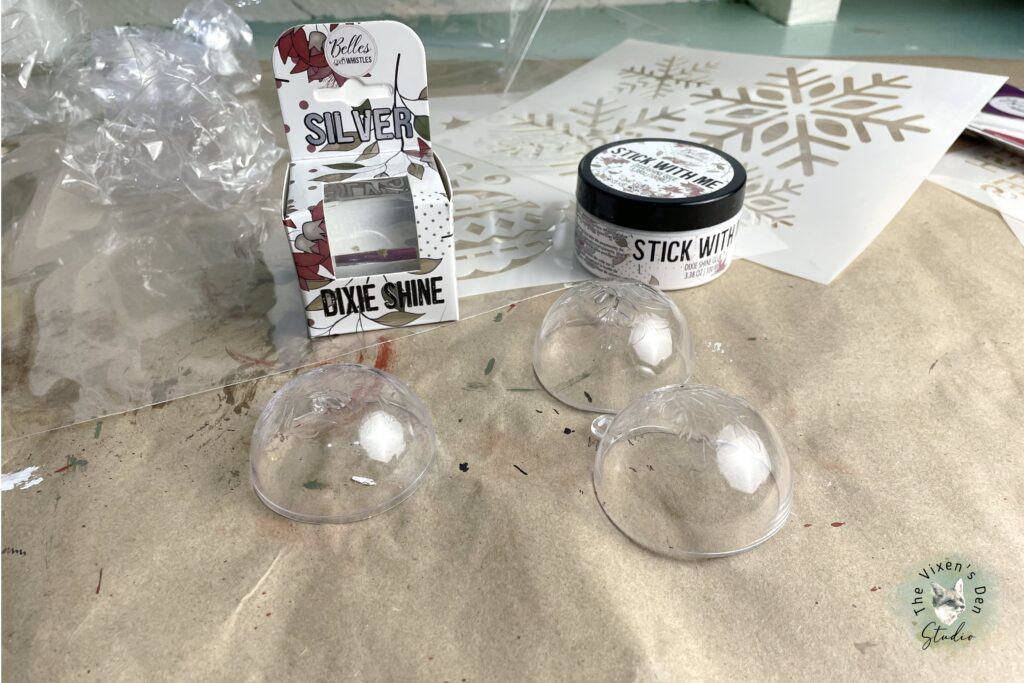 A set of clear glass ornaments on a table.