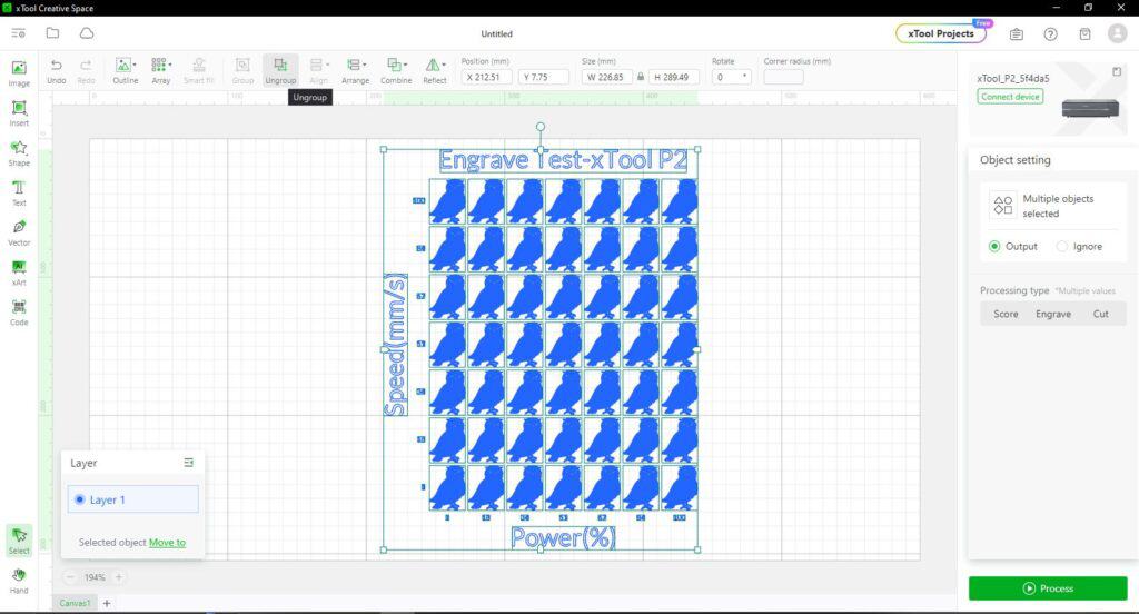 Screenshot of xTool Creative Space software showing a grid pattern with the text "Engrave Test xTool P2." Labels for speed (mm/s) and power (%) are also visible along the sides of the grid.