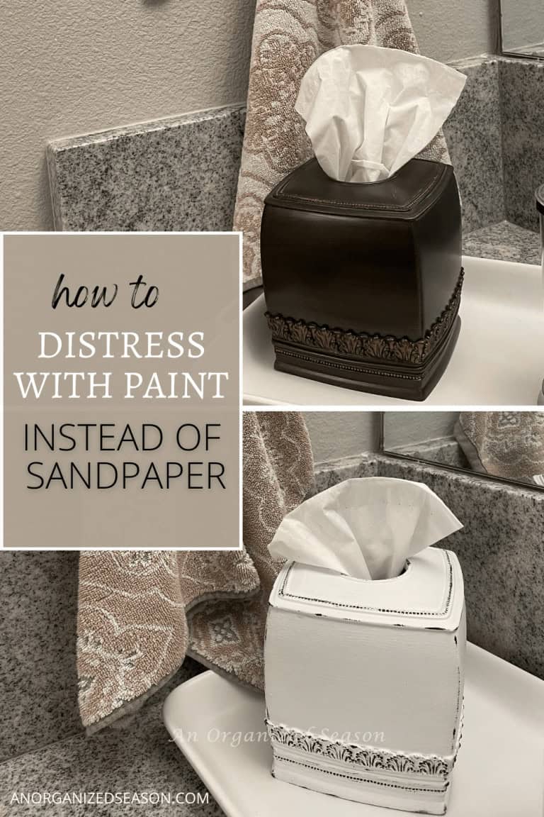 Two images show a tissue box cover painted for a distressed look, before and after painting. A caption reads "how to distress with paint instead of sandpaper." A mirror and towel are visible in the background.