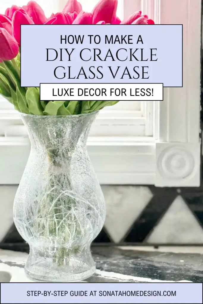 Glass vase with a crackle effect holds pink tulips in front of a geometric tiled background. Text overlay reads, "How to Make a DIY Crackle Glass Vase: Luxe Decor for Less!.