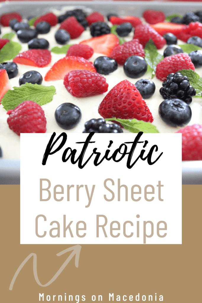 A sheet cake topped with fresh strawberries, raspberries, blackberries, and blueberries, with text overlay that reads "Patriotic Berry Sheet Cake Recipe.