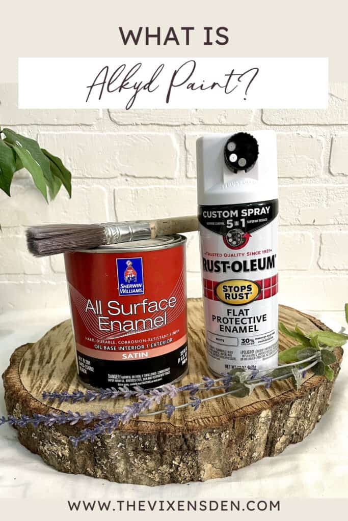 A can of All Surface Enamel paint, a can of Rust-Oleum spray paint, and a paintbrush are displayed on a wooden slab, with plants and text reading "What is Alkyd Paint?" above.