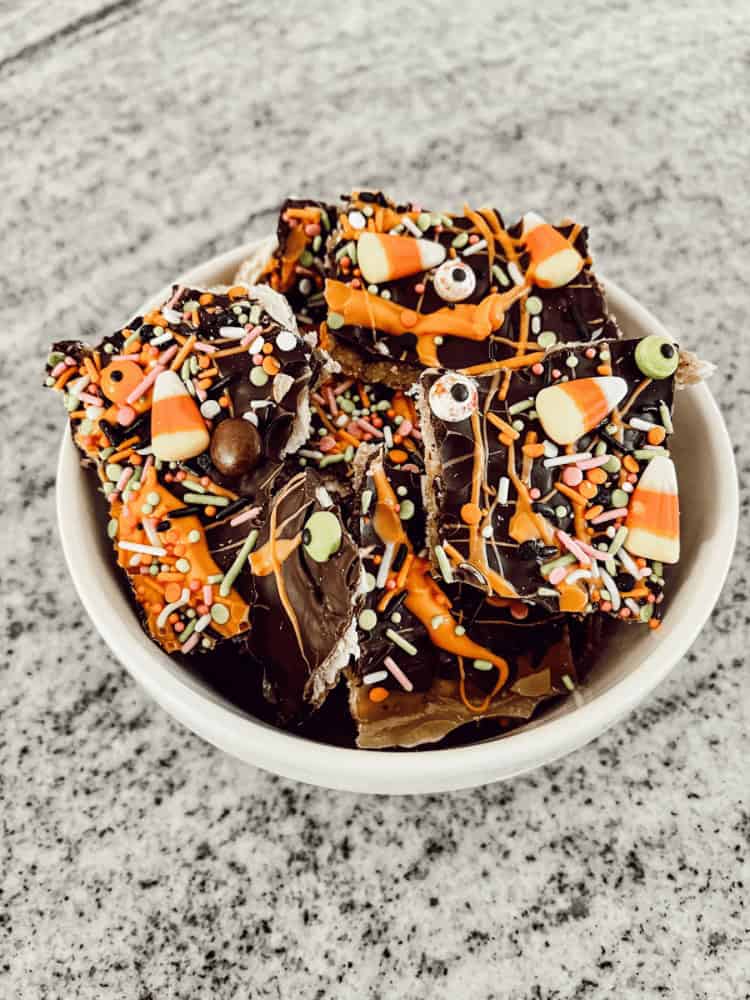 A bowl of chocolate covered candy corn.